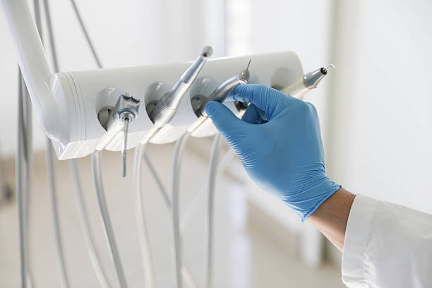 Professional Emergency Dentist technician working in Woodbury, NY
